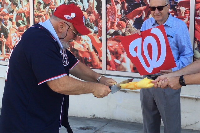 Video: Fans sacrifice rubber chicken outside Nationals Park in advance
of pivotal NLDS playoff game 4